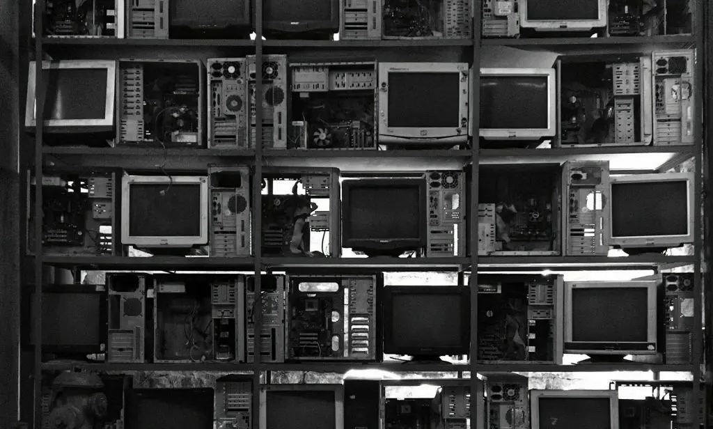 CRT monitors on shelves