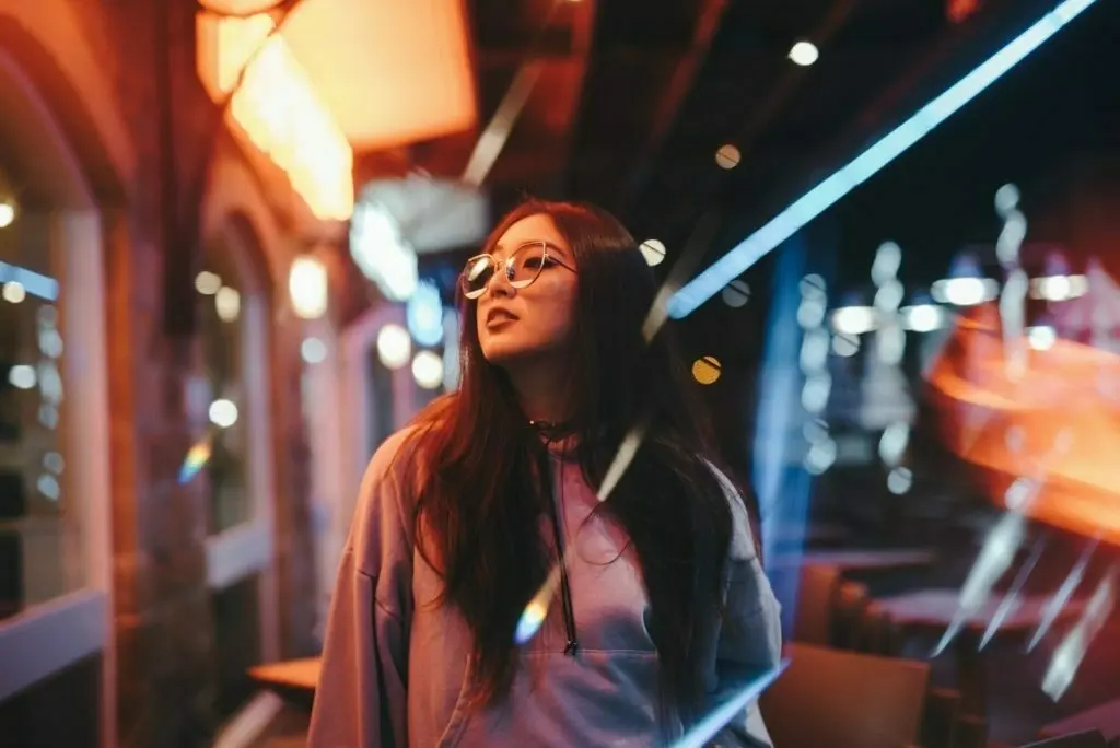 Young woman with lights