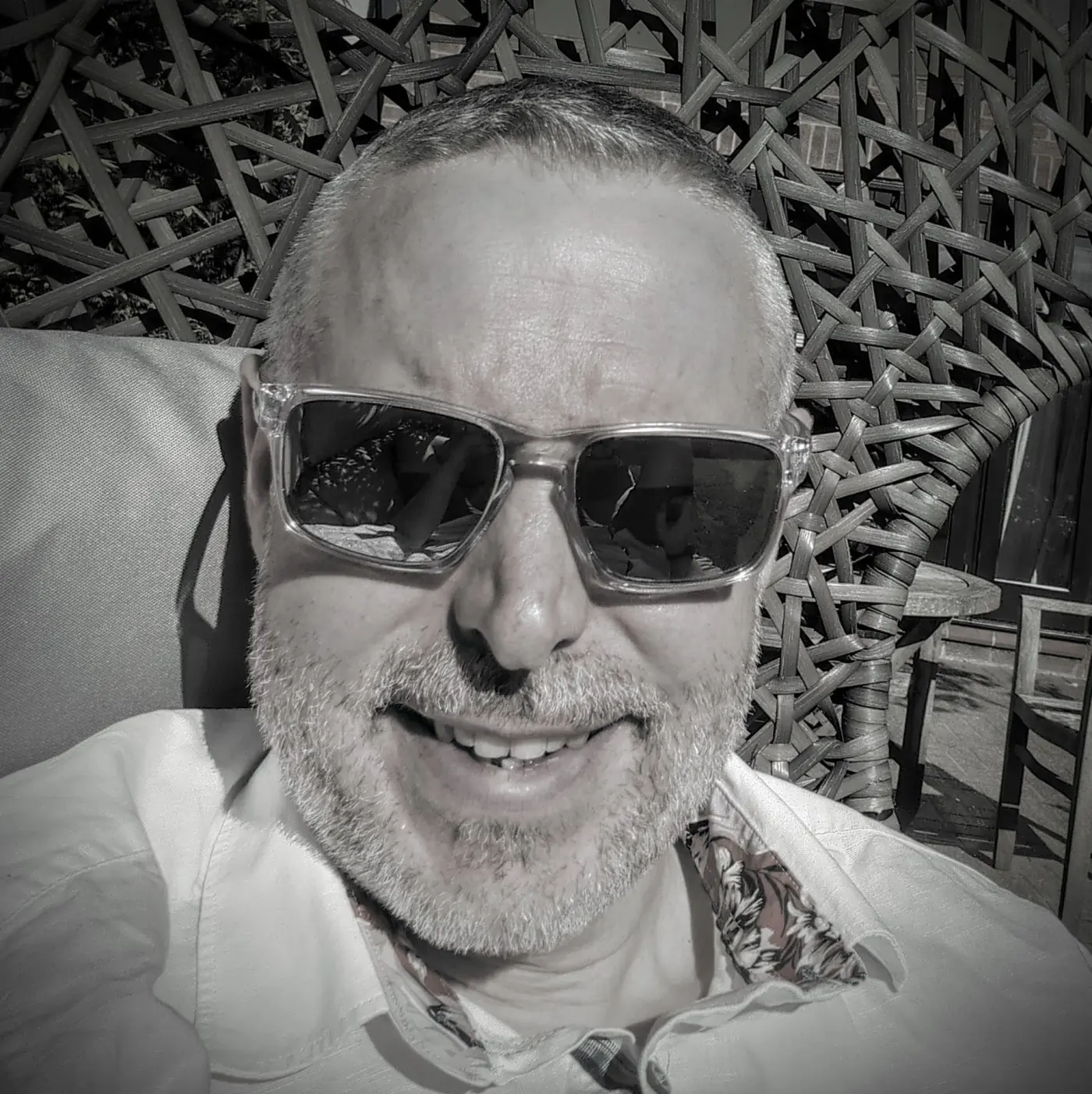 Doug reclining in a chair