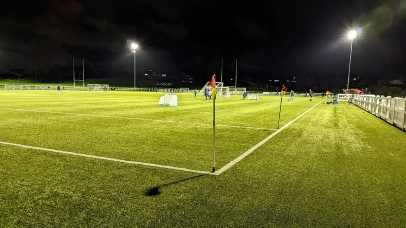 Artificial pitch with corner flag