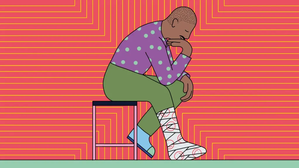 Man sitting with cast on leg