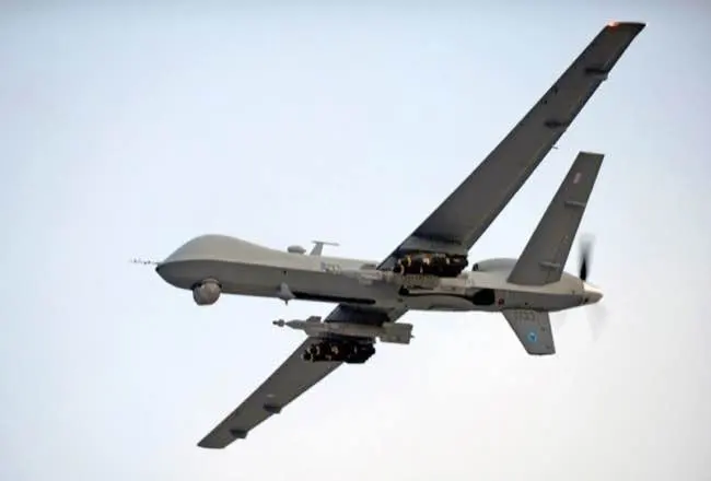 A Royal Air Force (RAF) Reaper UAV (unmanned aerial vehicle) is pictured airborne over Afghanistan during Operation Herrick.