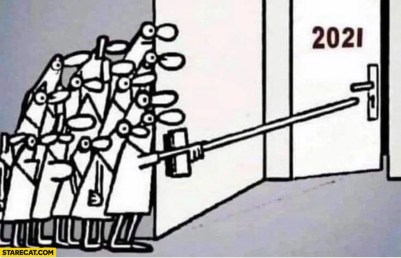 People standing behind a wall, tentatively pushing open a door marked '2021' using a large stick.