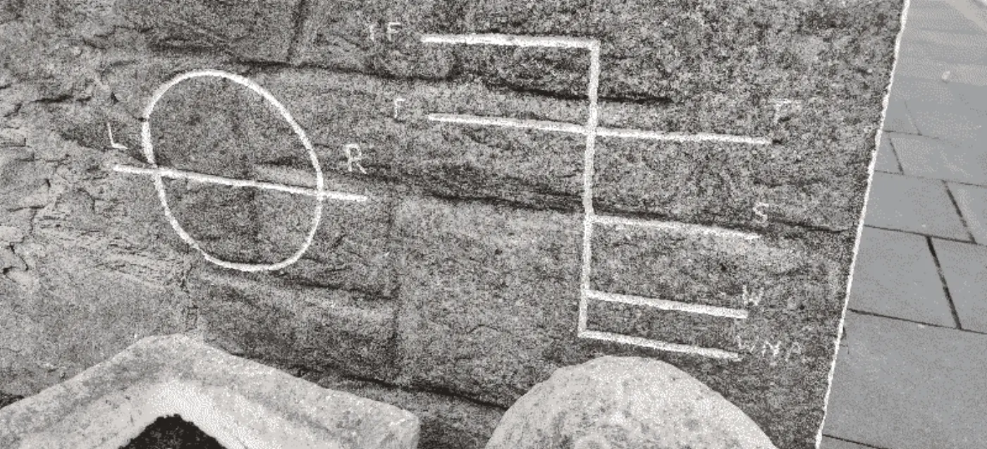 Lines on the side of a building at Seahouses, probably something to do with sailing