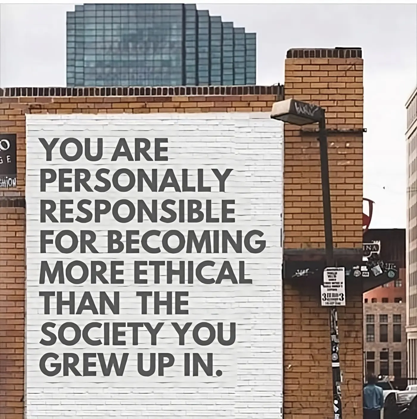 Mural which reads "You are personally responsible for becoming more ethical than the society you grew up in"