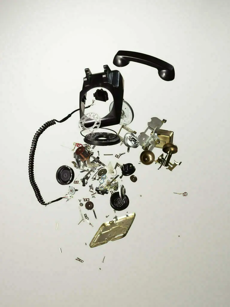 Exploded image of old rotary phone