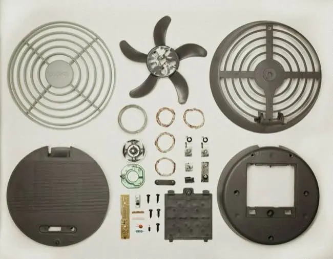 Disassembled fan, with parts neatly organised