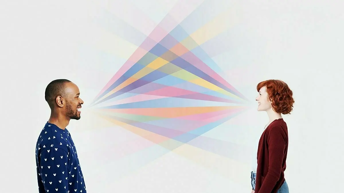 Two people talking to one another