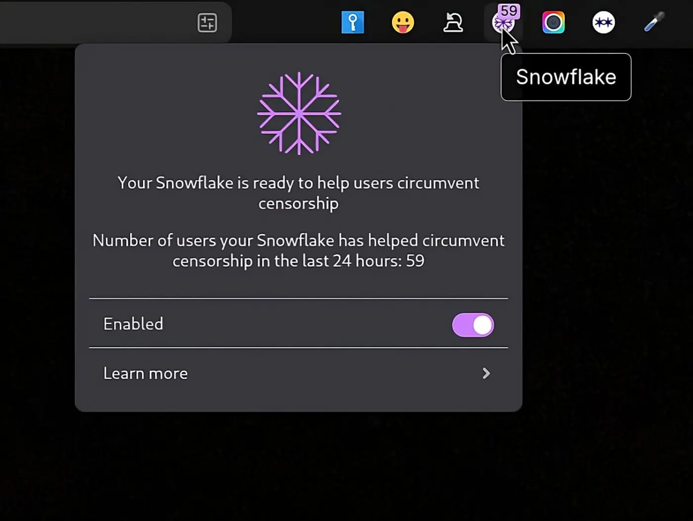 An icon with the number '59' and the label 'Snowflake' which has been clicked on. The small window which has popped out reads "Your Snowflake is ready to help users circumvent censorship"