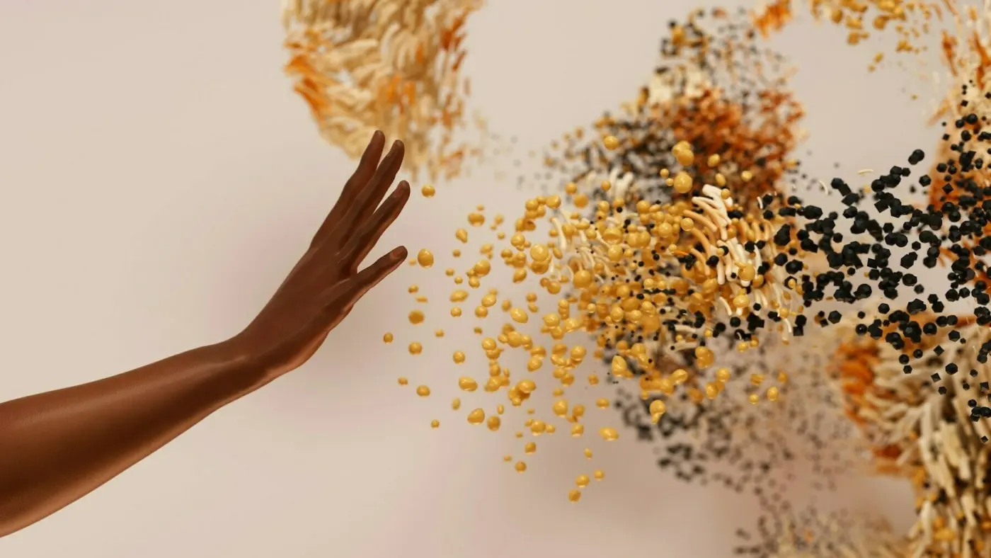 A hand reaching towards floating abstract shapes and spheres in various colours.